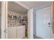 The laundry room is fully equipped with storage and a washer and dryer at 15000 Gulf Blvd # 901, Madeira Beach, FL 33708