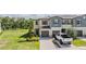 Charming two-story townhome featuring a two-car garage, manicured front lawn, and neutral paint scheme at 17592 Nectar Flume Dr, Land O Lakes, FL 34638