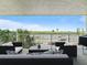 Enjoy outdoor living on this relaxing balcony with comfortable seating and beautiful water views at 18610 Gulf Blvd # 208, Indian Shores, FL 33785