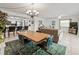 Dining area attached to the living room and kitchen at 18610 Gulf Blvd # 208, Indian Shores, FL 33785