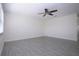 Spacious bedroom with large windows, tile flooring, and neutral paint at 1906 Canterbury Ln # 20, Sun City Center, FL 33573