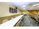 Game room with long tables for bingo and card games at 1906 Canterbury Ln # 20, Sun City Center, FL 33573