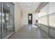 Enclosed patio featuring large windows allowing plenty of natural light at 1906 Canterbury Ln # 20, Sun City Center, FL 33573