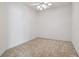 Clean, vacant bedroom with neutral carpeting and light walls at 19409 Weymouth Dr, Land O Lakes, FL 34638