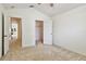 Carpeted bedroom with ceiling fan, and closet at 19409 Weymouth Dr, Land O Lakes, FL 34638