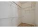 Walk-in closet with wire shelving, providing ample storage space at 19409 Weymouth Dr, Land O Lakes, FL 34638