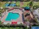 A refreshing community pool, sun loungers, gazebos, and playground, ideal for outdoor enjoyment at 19409 Weymouth Dr, Land O Lakes, FL 34638