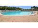 Large sparkling community pool with plenty of space for swimming and recreation at 19409 Weymouth Dr, Land O Lakes, FL 34638