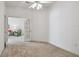 Bright room with carpet and french doors at 19409 Weymouth Dr, Land O Lakes, FL 34638
