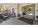 Comfortable seating area on the patio with outdoor furniture, perfect for relaxation and conversation at 19409 Weymouth Dr, Land O Lakes, FL 34638
