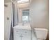 Cozy bathroom with a shower, modern vanity, and a toilet at 2018 Windsor Way, Tampa, FL 33619