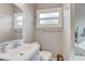 Stylish bathroom featuring a modern vanity, a window, and new fixtures at 2018 Windsor Way, Tampa, FL 33619