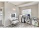 Bedroom featuring a built in vanity, workstation, and wood flooring at 2018 Windsor Way, Tampa, FL 33619