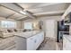 Modern kitchen featuring a granite island, stainless steel appliances, and an open floor plan at 2018 Windsor Way, Tampa, FL 33619