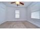 Well lit bedroom with carpet, fan and bright windows at 205 W Emma St, Tampa, FL 33603