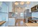 Kitchen featuring stainless appliances, butcher block countertops and white cabinetry at 205 W Emma St, Tampa, FL 33603