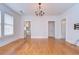 Bright living room with hardwood floors and elegant chandelier at 205 W Emma St, Tampa, FL 33603
