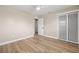Bedroom features light wood flooring, neutral walls, a ceiling fan, and closet at 2066 62Nd Pl S 62Nd Pl, St Petersburg, FL 33712