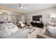 Inviting living room featuring a ceiling fan, an open floor plan, and contemporary decor at 2066 62Nd Pl S 62Nd Pl, St Petersburg, FL 33712