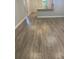 Spacious living room boasting wood floors and plenty of natural light, perfect for entertaining at 2160 Corbin Pl # C, Palm Harbor, FL 34683