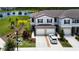 Beautiful townhome with two-car garage and lake view at 2190 Great Sapphire Ln, Lutz, FL 33558