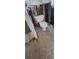 Bathroom featuring toilet and exposed framing at 2469 Trade Winds Dr, Dunedin, FL 34698