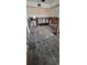 Kitchen with exposed framing and subflooring ready for renovation at 2469 Trade Winds Dr, Dunedin, FL 34698