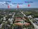 Aerial view of community with lush trees and view of Safety Harbor, Phillipe Park, and Tampa Bay at 2640 Enterprise E Rd # B25, Clearwater, FL 33759