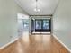 Bright dining room featuring wood flooring and a sliding glass door at 2640 Enterprise E Rd # B25, Clearwater, FL 33759
