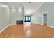 Spacious living room featuring sleek wood floors and ample natural light at 2640 Enterprise E Rd # B25, Clearwater, FL 33759