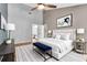 Main bedroom featuring a ceiling fan, neutral-colored walls, decor, and furniture at 2640 Enterprise E Rd # B25, Clearwater, FL 33759