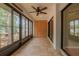 Bright sunroom with large windows and tile flooring at 2640 Enterprise E Rd # B25, Clearwater, FL 33759