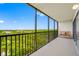 Outdoor balcony offering scenic views and a cozy seating area at 2900 Cove Cay Dr # 7C, Clearwater, FL 33760