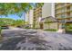 Exterior view of the building entrance and covered parking area at 2900 Cove Cay Dr # 7C, Clearwater, FL 33760