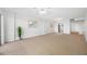 Spacious living room with carpet, neutral walls, and plenty of natural light at 2900 Cove Cay Dr # 7C, Clearwater, FL 33760