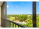 Balcony view of the golf course and surrounding landscape at 2900 Cove Cay Dr # 7C, Clearwater, FL 33760