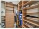 Walk-in closet with custom shelving and ample storage space at 32015 Summerglade Dr, Wesley Chapel, FL 33545