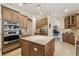 Kitchen includes stainless steel appliances, granite countertops, and center island at 32015 Summerglade Dr, Wesley Chapel, FL 33545