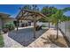 Backyard featuring a pergola, lush landscaping, and a private fence for outdoor living at 3242 Brushwood Ct, Clearwater, FL 33761