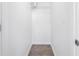 Empty storage space with tile floors, white walls, and wire rack at 3305 Haviland Ct # 101, Palm Harbor, FL 34684