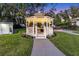 Inviting backyard gazebo featuring decorative trim, lighting, and a cooking area for outdoor entertaining at 3425 W Forest Lake Cir, Sarasota, FL 34232