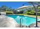 Refreshing pool with a textured pool deck, offering a perfect spot for summer relaxation and enjoyment at 3425 W Forest Lake Cir, Sarasota, FL 34232