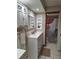 Bathroom with a double vanity and patterned shower curtain at 3536 Countrybrook Ln # 13, Palm Harbor, FL 34684