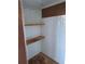 Interior view of storage closet with shelves at 3536 Countrybrook Ln # 13, Palm Harbor, FL 34684