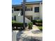 Charming condo featuring updated exteriors, lush landscaping, and private entrances at 3536 Countrybrook Ln # 13, Palm Harbor, FL 34684