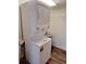 New stacked washer and dryer in the laundry room at 3536 Countrybrook Ln # 13, Palm Harbor, FL 34684