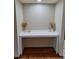 A cozy office nook features a built-in desk and stylish decor accents at 3536 Countrybrook Ln # 13, Palm Harbor, FL 34684