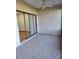Enclosed patio with access to interior at 3536 Countrybrook Ln # 13, Palm Harbor, FL 34684