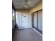 Enclosed patio with tile flooring and ceiling fan at 3536 Countrybrook Ln # 13, Palm Harbor, FL 34684