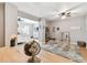 Bedroom area featuring wood floors and an open plan to a living space at 3673 Fremantle Dr, Palm Harbor, FL 34684